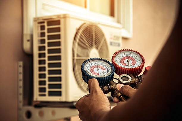 Professional Heat Pump Repair technician working in Warren, NJ